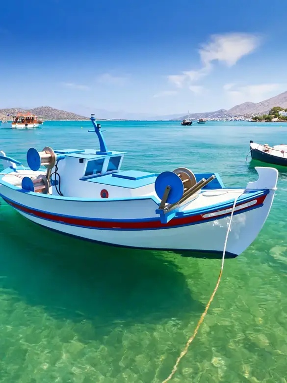 fishing-boats-at-the-coast-of-crete-greece_shutterstock_113724493.webp