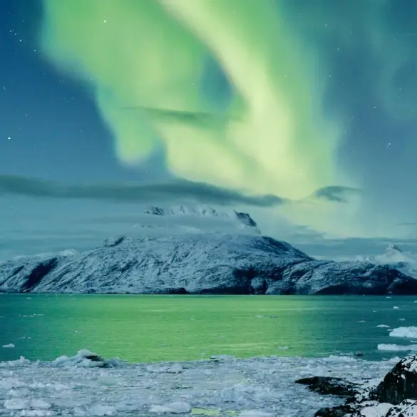 Northern Lights Over The Mountain Sermitsiaq In Nuuk In Greenland